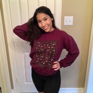 Wine Colored Obey Sweatshirt with a Floral Design